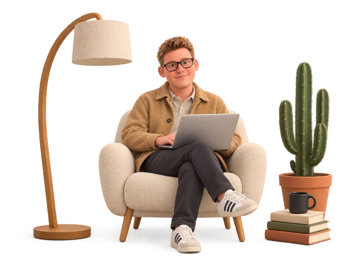 Daniël in an armchair with a laptop, floor lamp, cactus and books